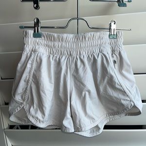 White womens high rise track that lululemon shorts size 4 (length 4)